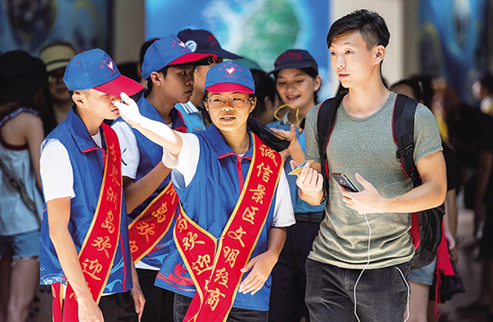 候鸟志愿者守护鹿城文明-新华网海南频道