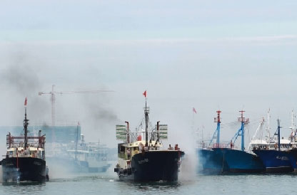 海南赴南沙最大规模渔船船队返回三亚